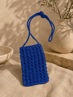 lue handmade paper yarn crochet phone bag with a long crossbody strap.