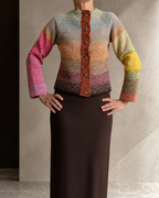 Front view of the one-of-a-kind crochet cardigan showing its round neckline, contrasting placket and six buttons.