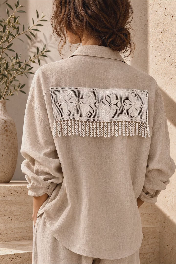 Video showing a white floral crochet lace panel styled on the back of a beige blouse