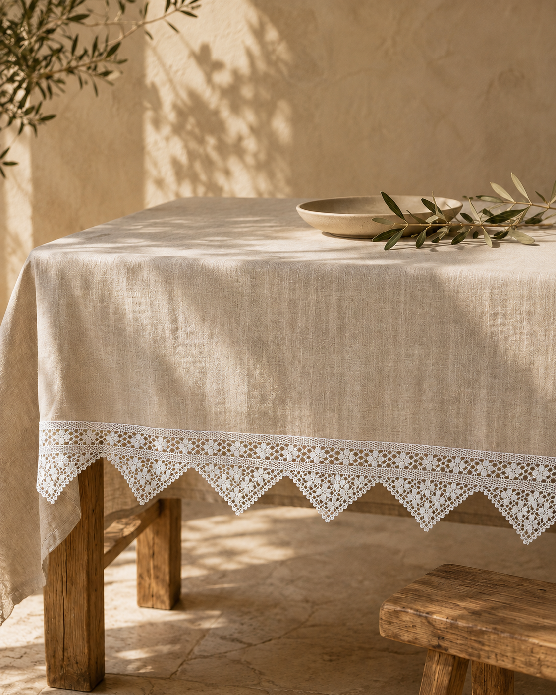 White crochet lace border styled along the edge of a table textile as an application example.