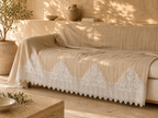 White stepped crochet lace styled along a textile cover as a home decor application example; the cover and furniture are not included.