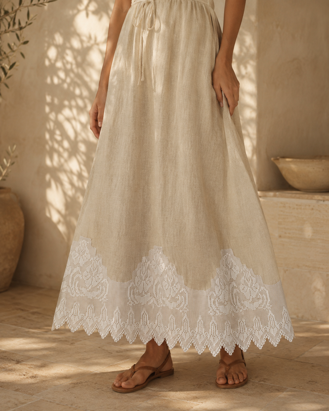 White stepped crochet lace styled along a flowing skirt as a garment application reference; the skirt is not included.