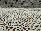 Close-up of the white crochet table linen showing the floral motifs, joining points and fine No. 70 cotton thread texture.